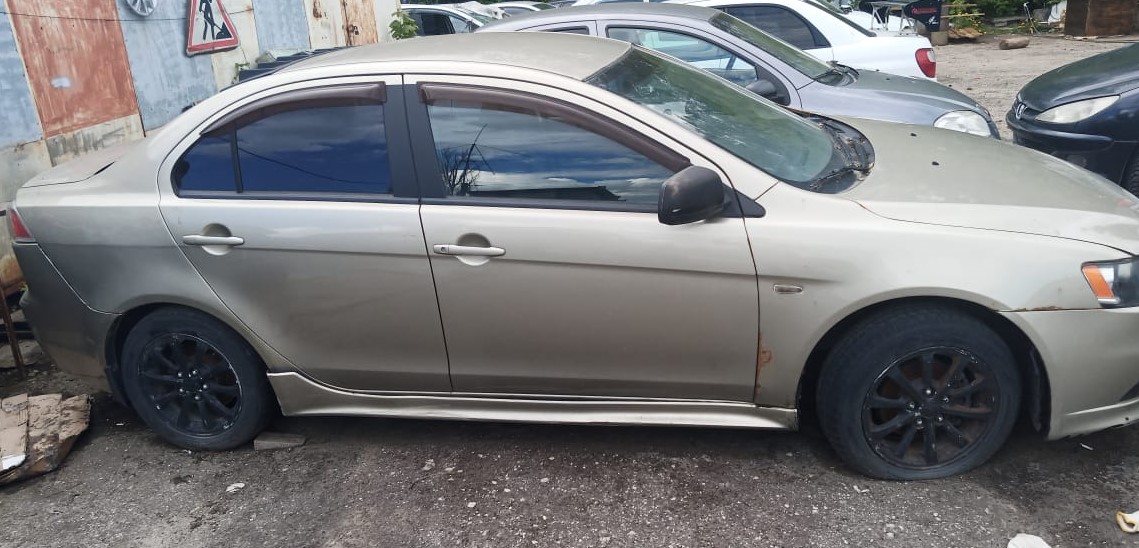 Mitsubishi Lancer фото 1