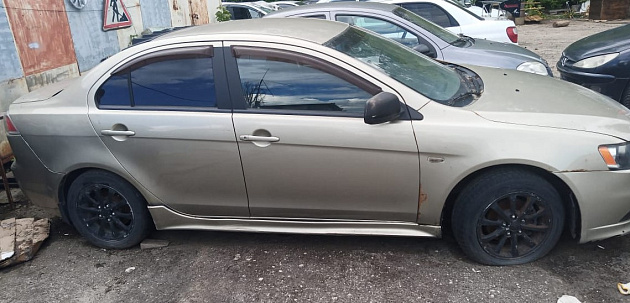Mitsubishi Lancer фото 1